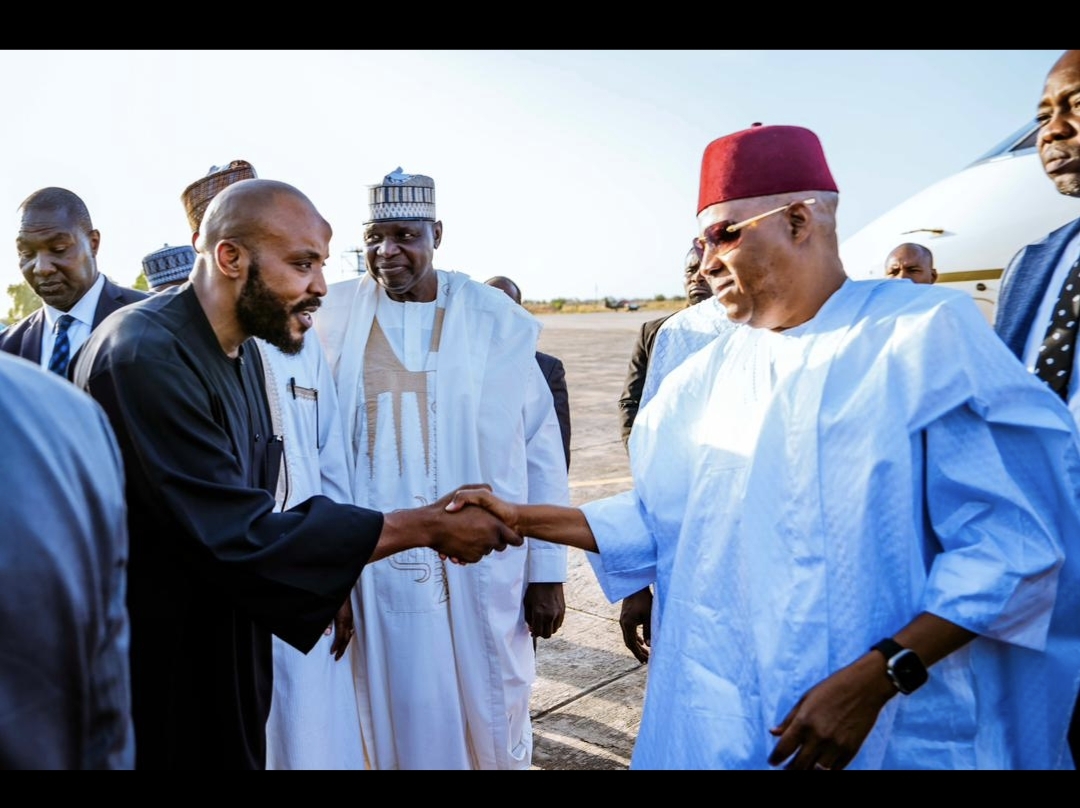 Dr. Mahmuod Alfa in a handshake with VP Kashim Shettima