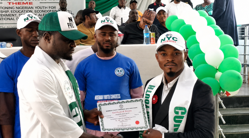 Comr. Oloruntoba Juwon receiving Certificate of Return from the National President, Engr. Jethro Annum