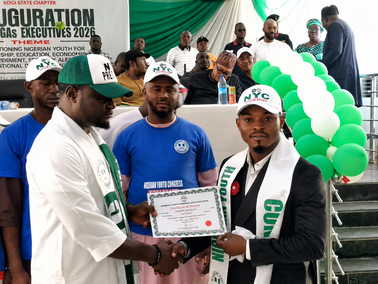 Comr. Oloruntoba Juwon receiving Certificate of Return from the National President, Engr. Jethro Annum